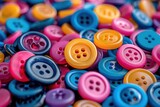 Fototapeta Panele - Colorful Assortment of Sewing Buttons in Blue, Yellow, and Red Hues