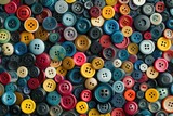 Fototapeta Panele - Colorful Assortment of Sewing Buttons in Blue, Yellow, and Red Hues