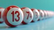 Close up of white lottery balls on pastel background, with focus on lucky number 13