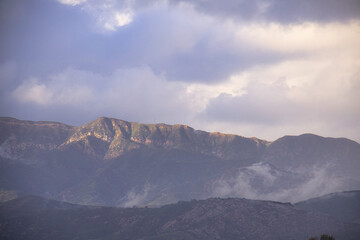 Wall Mural - Winter storms approach the Santa Barbara channel at sunset.