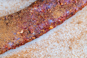 Wall Mural - very spicy pork meat with red hot pepper on the table