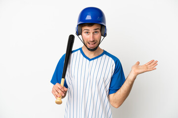 Wall Mural - Young caucasian man playing baseball isolated on white background with shocked facial expression