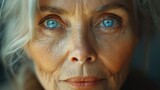 Fototapeta Sport - Grandma wrinkles close up. Old lady look. Senior elderly female face closeup. Retired 60s woman macro shot. Beautiful grandmother. Natural beauty concept. Aged 70s pensioner eyelids. Eyes health care.