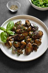 Wall Mural - Roasted chicken liver with mushrooms