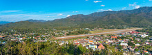 Panoramic View From The Mountain Of Wat Phrathat Doi Kiew Khamin To Airport And The City Of Mae Hong Son In The North Of Thailand. The City Is Located In The Shan Hills Near The Border With Myanmar