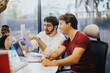 © qunica.com - Business team working together on analyzing statistics for marketing strategy.