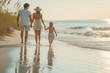 © Nemesio - Family strolling along the shore of a beach at sunset in summer. Family vacation image