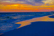 Beautiful sunset on the beach with multiple colors 