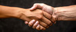 © DRasa - Two multiracial people shaking hands. Business meeting. Great design for any purposes. Dark background. Banner.