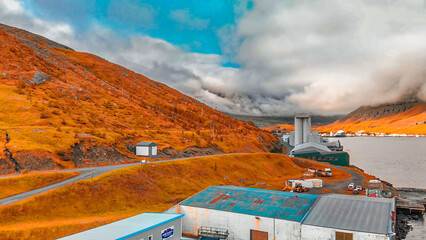 Canvas Print - Aerial view of Seydisfjordur, a small town by the fjords at the northeast part of Iceland