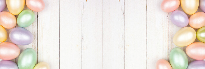 Poster - Easter Egg double border over a white wood banner background. Shiny pastel eggs. Copy space.