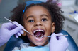 little girl at a Children's dentistry for healthy teeth and beautiful smile. Portrait of smiling little girl in dental chair. copy space. clinic healthcare concept.