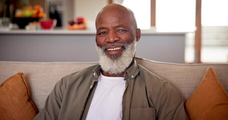 Poster - Face, home and senior man on a sofa, relax and happiness with retirement and wellness with smile. African person, pensioner and elderly guy on a couch and apartment with weekend break and peaceful