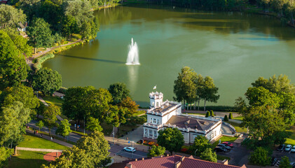Wall Mural - Aerial panoramic view of Lithuanian resort Druskininkai. Druskininkai in autumn colours, drone picture of multi coloured trees in most beautiful city of Druskininkai in Lithuania