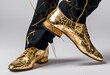 © Wirestock - a person in gold leather shoes on a white surface at the end