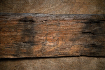 Wall Mural - A photo of the texture of old wood. A wooden piece from an ancient ship.