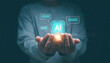 © krungchingpixs - Ai tech, Businessman hands holding hologram of smart bot AI and chat icon, Use Artificial Intelligence by enter command prompt for generates something, Futuristic technology transformation.