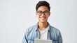 Image of young asian man, company worker in glasses, smiling and holding digital tablet, standing over white background