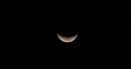 Wall Mural - Crescent moon on winter night over mexico