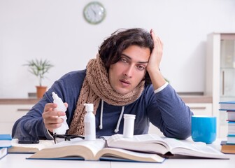 Wall Mural - Sick male student suffering at home