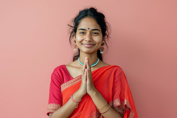 Wall Mural - indian young woman namaste and smiling