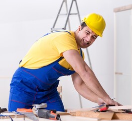 Wall Mural - Floor repairman disappointed with his work