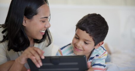 Poster - Tablet, smile and kid with mother on bed watching video, movie or show on the internet. Happy, bonding and boy child with young mom streaming film on digital technology in bedroom at family home.