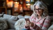 Mature Woman using smartphone sitting on couch with a fee space for text, Generative AI.