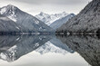 Reflection of Snowy mountains at Chilliwack Lake, BC