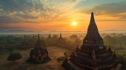 At the tip of the pagoda in the land of Burma, the sun sets with beautiful light. Beautiful view as far as the eye can see, high angle