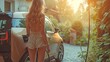 Gorgeous woman in a miniskirt begins charging the electric vehicle
