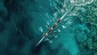 © buraratn - Aerial drone top ultra wide panoramic view of sport canoe rowing synchronous team of athletes competing in deep blue sea