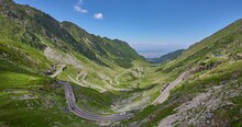 Time Lapse Of The Transfagarasan Mountain Road At Early Morning With Huge Amount Of Holiday Traffic  Transversing The Carpathian Mountains In The Country Of Romania