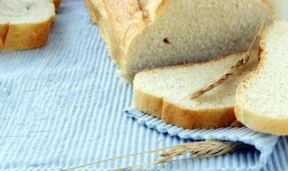 Poster - white bread loaf on a wooden table