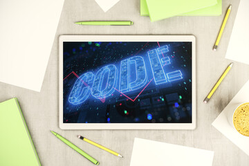 Poster - Creative Code word hologram on modern digital tablet display, artificial intelligence and neural networks concept. Top view. 3D Rendering