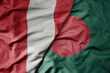 big waving national colorful flag of bangladesh and national flag of peru .