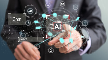 Leinwandbilder - Artificial intelligence concept businessman holding ai on computer screen to using for in document management system and data analysis works