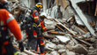 Firefighters in reflective gear carefully navigate through the debris of a collapsed building during a search and rescue operation.