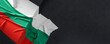 Flag of Bulgaria. Fabric textured Bulgaria flag isolated on dark background. 3D illustration