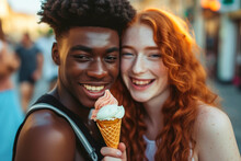 Two Teenage Friends, A Red-haired Girl, An African-American Boy, They Are Eating An Ice Cream Cone, Cheerful And Fun Attitude In The City,