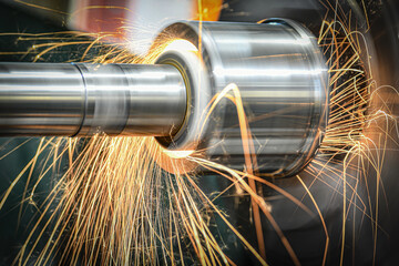 Wall Mural - Coarse grinding of inner bore on a circular grinding machine with sparks.