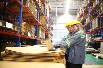 worker or engineer working in factory with safety uniform , safety hat and safety glasses , image is safety concept or happy workplace