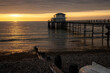 Totland Bay pier, close to Freshwater, on the Isle of Wight at sunset