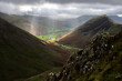 Sun’s rays on Nether Wasdale on an overcast wet day in Lake District