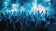 © ColdFire - A crowd of people at a concert in blue tones