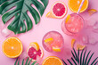 creative summer pink concept background with drink and fruits and tropical leaves