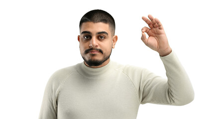 Canvas Print - A man, close-up, on a white background, shows an ok sign