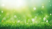 Green Grass Field And Blue Sky Create A Summer Landscape Background With A Blurred Bokeh Effect.