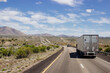 © Liudmila - Beautiful blue sky with fluffy clouds over the highway on a spring day. Arizona sign. Scenic road in Arizona, USA on a sunny summer day. Arizona, USA - 17 April 2020