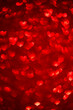 © iloli - red background with heart-shaped highlights. Beautiful holiday background, background for postcards